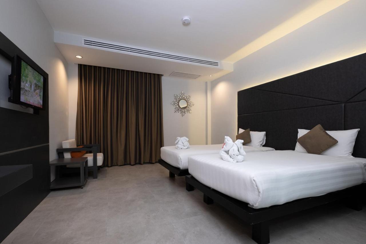 The Royal Palm Beach Front Patong Exterior photo